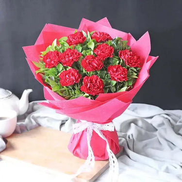 Carnation Elegance Bouquet, Red Carnations, Green Leaves, Red Wrap, Ribbon Bow